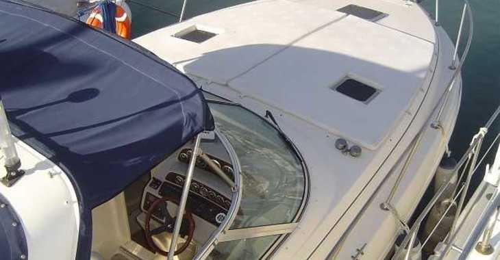 Rent a motorboat in Puerto del Candado - Rinker 310 Fiesta Vee