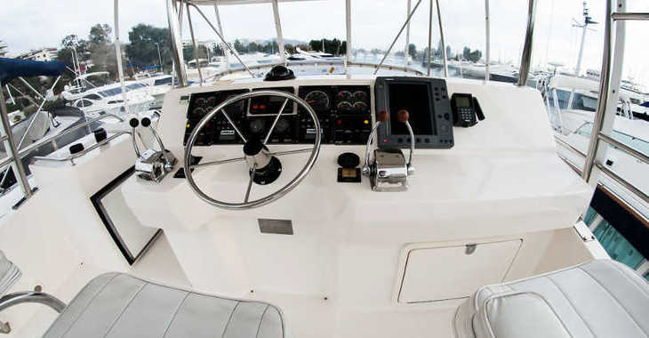 Rent a yacht in Alimos Marina - Riviera 48