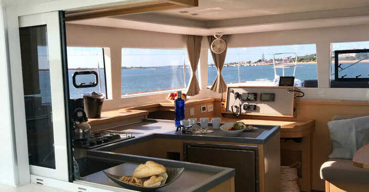 Rent a catamaran in Club Naútico de Sant Antoni de Pormany - Lagoon 450 Sport owners version ( 3 cabins + 3 wc)
