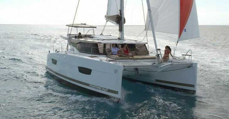 Rent a catamaran in Naviera Balear - Fountaine Pajot Lucia 40 - 3 cab.