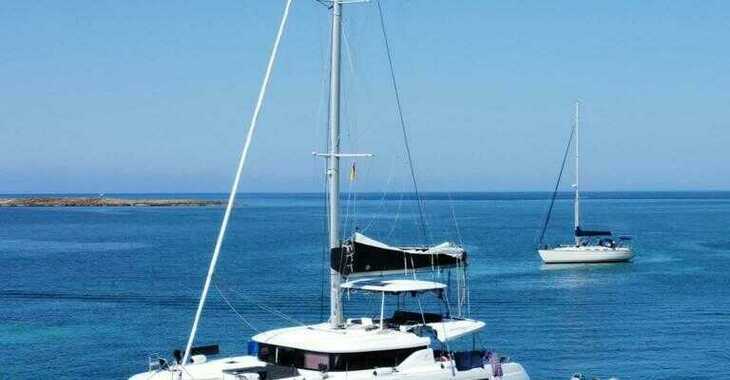 Rent a catamaran in Naviera Balear - Lagoon 46 Amanaci  (LUXURY Equipped, SUPs, Watertoys, A/C, W-Maker, Gen, Teak, Wi-Fi,...