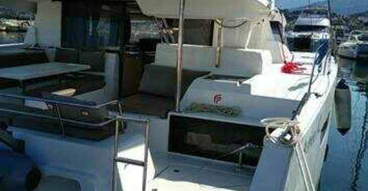 Rent a catamaran in Portu Valincu - Fountaine Pajot Astrea 42 - 4 + 2 cab.