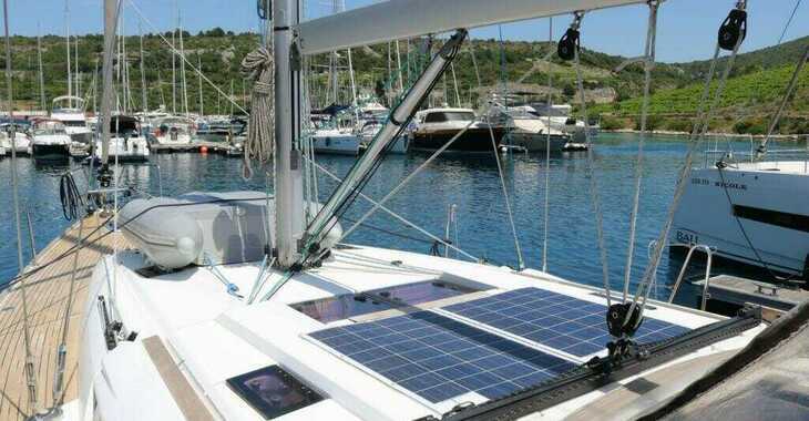 Chartern Sie segelboot in Muelle de la lonja - Sun Odyssey 469 