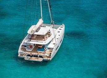Rent a catamaran in Naviera Balear - Lagoon 55 SlowDown (LUXURY Equipped, SUPs, Watertoys, A/C, W-Maker, Gen, Teak, Wi-Fi, Underwater Lights,...