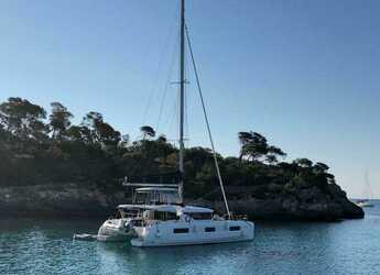 Rent a catamaran in Naviera Balear - Lagoon 46 Skalem Owner's Version  (LUXURY Equipped, SUPs, Watertoys, A/C, W-Maker, Gen, Teak, Wi-Fi, Underwater Lights,...