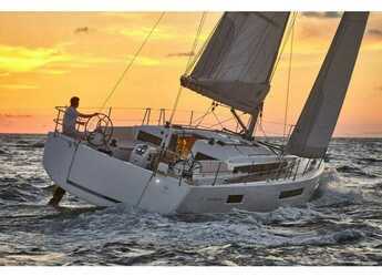 Chartern Sie segelboot in Muelle de la lonja - Sun Odyssey 490