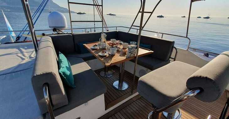 Rent a catamaran in Marina of Charles Ornano - SUNREEF 62