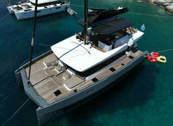 Rent a catamaran in Vlychada Marina - Moon Yacht 60 