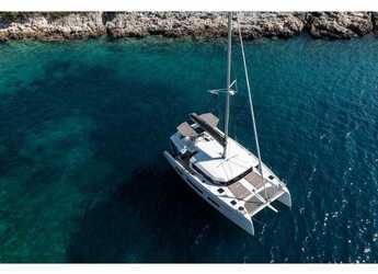 Chartern Sie katamaran in Porto Capo d'Orlando Marina - Dufour 48