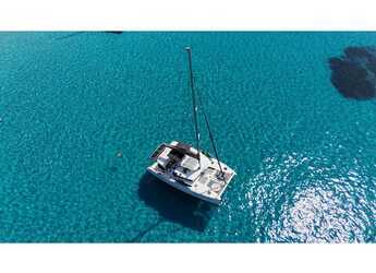 Rent a catamaran in Marina di Cannigione - Lagoon 450  Fly (A/C-Generator-Watermaker-SolarPanel)