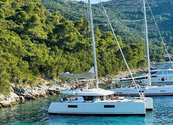 Rent a catamaran in Marina Skiathos  - Lagoon 52[G]