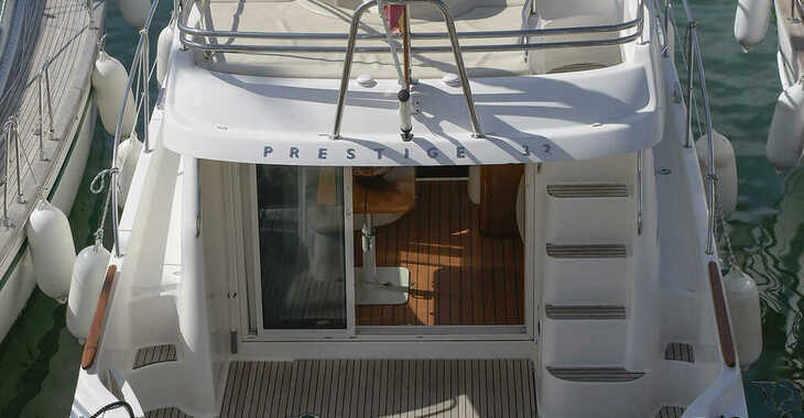 Rent a motorboat in Port d'Aiguadolç - Prestige 32